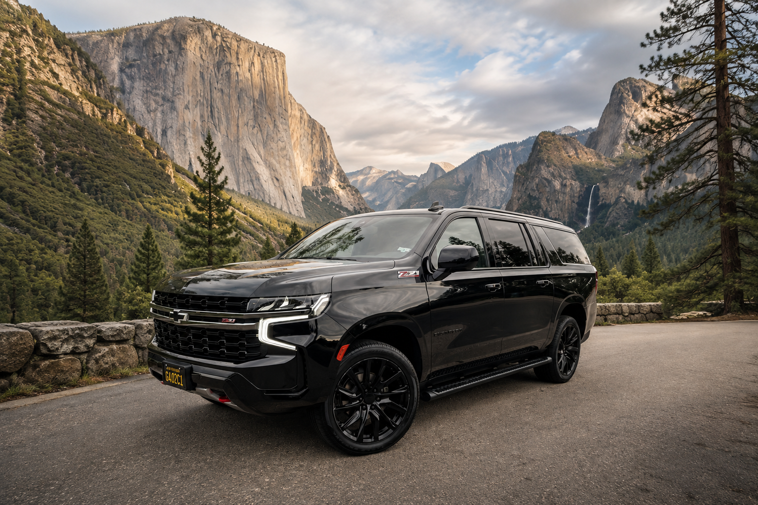 Black premium SUV near mountain valley
